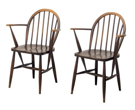 A pair of Ercol Mid Century elm and beech armchairs. Model 370a. (2)