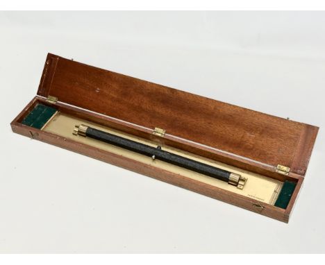 A vintage brass parallel rolling ruler, with case. 63cm