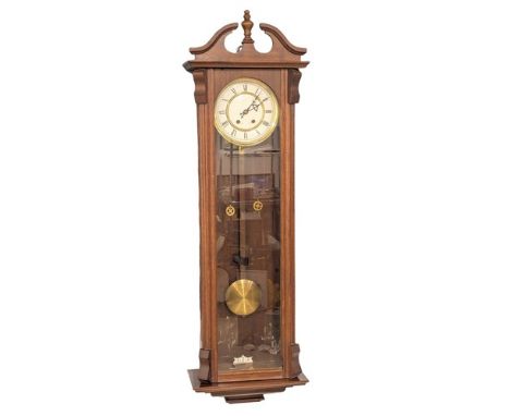 A large Victorian style Vienna wall clock with double weights and pendulum. 120cm