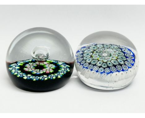 Two large millefiori glass paperweights. 1 by Caithness.