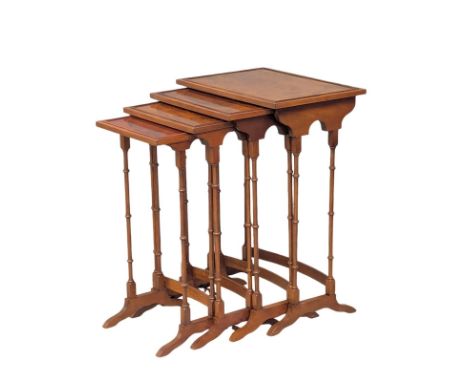 A vintage Georgian style yew wood nest of tables. 50x35.5x72cm(7)