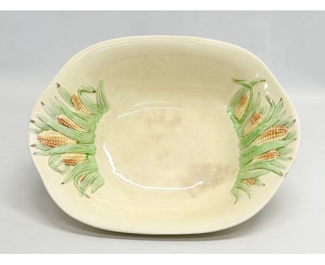 A 1930’s Clarice Cliff “Corncob” bowl by Newport Pottery &amp; Co. 29x23.5x6cm