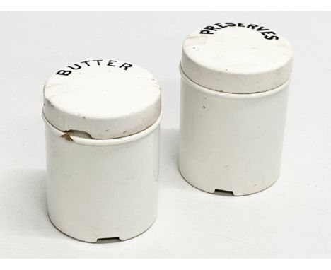 A pair of Early 20th Century ceramic preserve jars. Butter &amp; Preserves. Marks CWS &amp; S. 8x10cm.