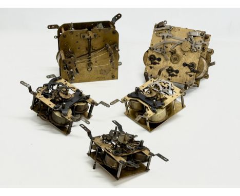 Five 19th Century German clock parts/clock works.