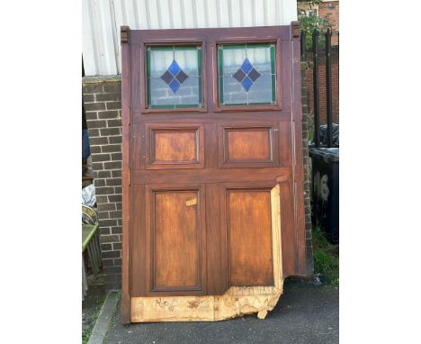 A very large mahogany framed double sided panel with 2 stained glass windows. 151x245cm.