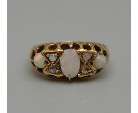 A vintage 18ct gold, opal and diamond ring, Chester marks, 2.9g, L 
