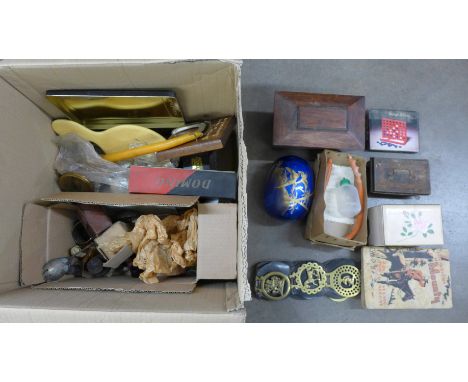 A box of assorted items, horse brasses, sarcophagus tea caddy, Gunn &amp; Moore cricket bat, flatware, stamp album, tokens, e