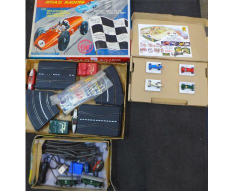 A Kader road racing set, a 1960's train set and a set of model vehicles by Lledo 
