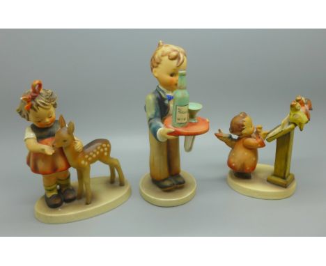 Three Hummel figures, waiter restored