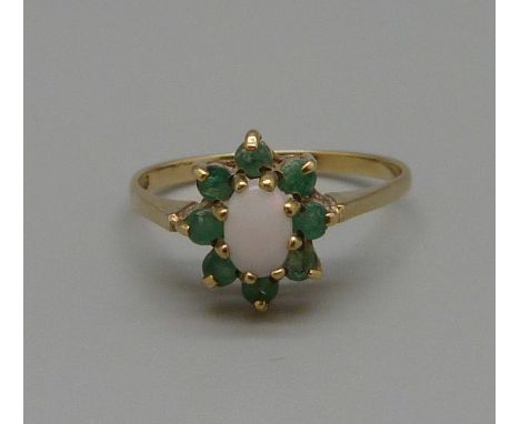 A 9ct gold, opal and emerald ring, 1.9g, O 