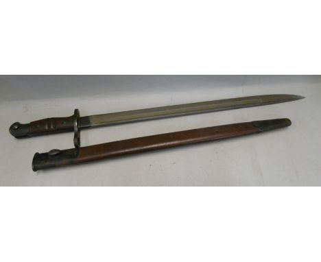 A bayonet with scabbard, marked Remington, 1913, 5-17 