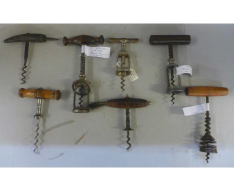 Seven vintage assorted English and German corkscrews including Edward Becker - The Columbus and Dunisch &amp; Scholer - The H