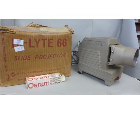 A Hi-Lyte 66 screen projector and a screen, two slide formats and spare lens included **PLEASE NOTE THIS LOT IS NOT ELIGIBLE 