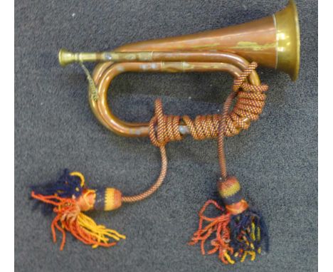 A copper and brass bugle 