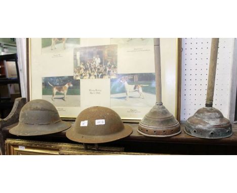 Two military helmets possibly first world war, together with two copper dollies.&nbsp;