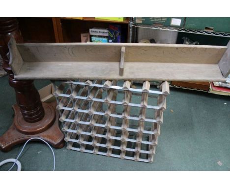 A oak wall shelf together with multi bottle wine rack.