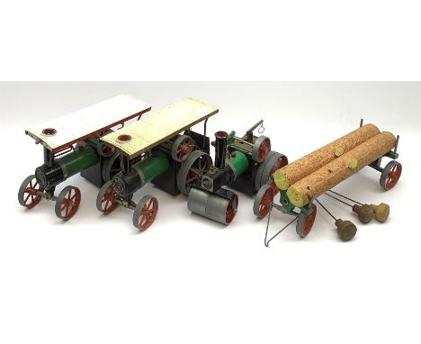 Two Mamod TE1A traction engines with steering rods; Mamod SR1 steam roller with steering rod; and Mamod lumber trailer, all u