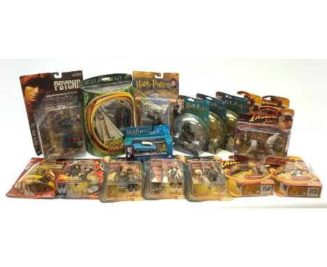 Assorted action figures - five Pirates of the Caribbean; five Indiana Jones; one Lord of the Rings; one Psycho; and four Harr