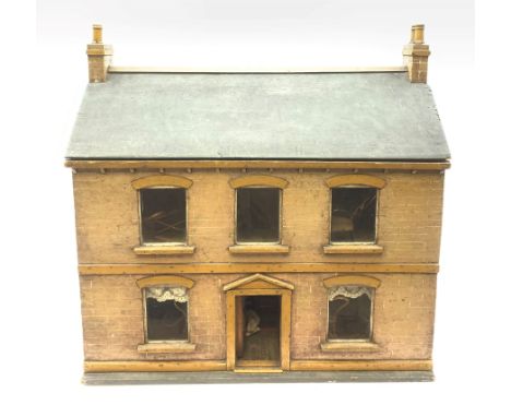 Victorian pine doll's house of double fronted two-storey form with brick painted facade and chimney stacks and grey painted p