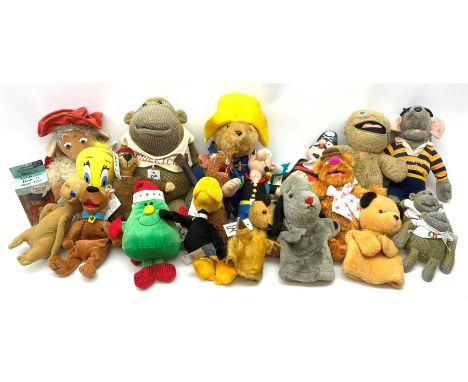 Twenty-one TV and film related and promotional soft toys including Sooty and Sweep hand puppets, Captain Pugwash, Muppets, Yo