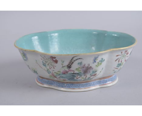 A CHINESE FAMILLE ROSE PORCELAIN QUATREFOIL PLANTER, painted with birds and flora, the interior with turquoise glaze, charact