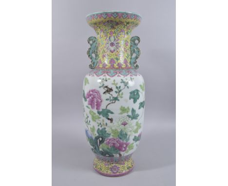 A LARGE CHINESE FAMILLE ROSE PORCELAIN TWIN HANDLE VASE, with enamel-painted birds and native flora, further decorated with f