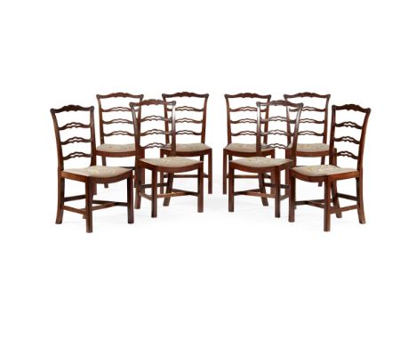 SET OF EIGHT SCOTTISH GEORGIAN STYLE DINING CHAIRS EARLY 20TH CENTURY the serpentine top rails above pierced ladder backs and