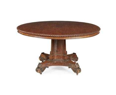 REGENCY MAHOGANY BREAKFAST TABLE EARLY 19TH CENTURY the circular tilt top with a gadroon carved edge above a concave frieze, 