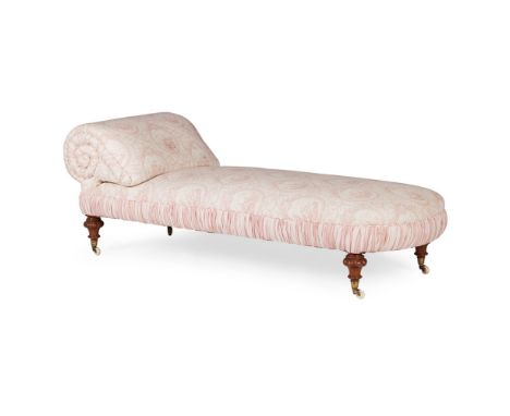 VICTORIAN UPHOLSTERED CHAISE LONGUE 19TH CENTURY the upholstered scrolled headrest and long padded seat raised on turned legs