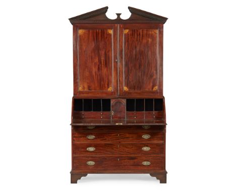 GEORGE III MAHOGANY BUREAU BOOKCASE 18TH CENTURY the dentil moulded broken-arch pediment over a pair of doors marked at the c