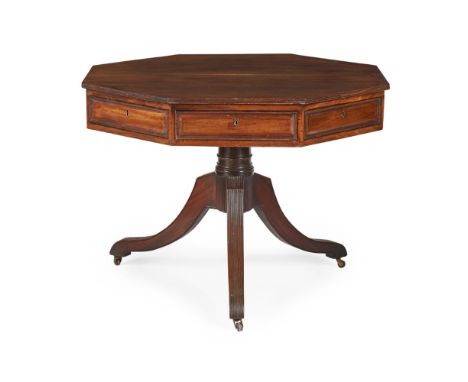 REGENCY MAHOGANY OCTAGONAL DRUM TABLE EARLY 19TH CENTURY the top with a reeded edge, over four short and four dummy drawers, 