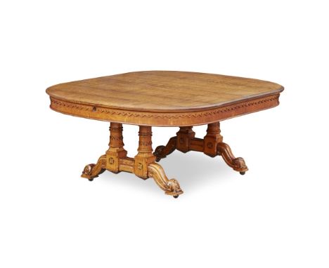 VICTORIAN GOTHIC REVIVAL OAK EXTENDING DINING TABLE 19TH CENTURY the rounded rectangular top above a serrated moulded frieze,