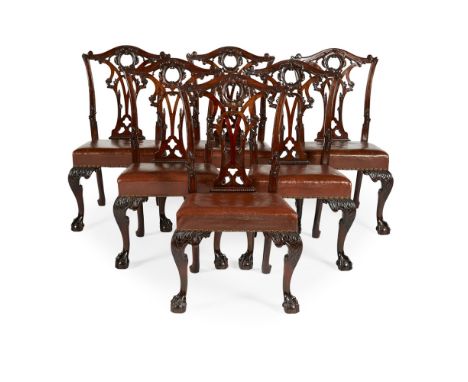 SET OF EIGHT CHIPPENDALE-STYLE DINING CHAIRS EARLY 20TH CENTURY comprising six side chairs and a pair of armchairs, the serpe