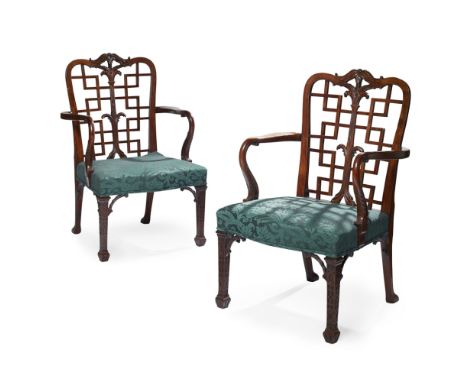 PAIR OF GEORGE III CHINESE CHIPPENDALE MAHOGANY ARMCHAIRS 18TH CENTURY the serpentine top rails carved with acanthus over tre