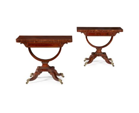 PAIR OF REGENCY MAHOGANY CARD TABLES EARLY 19TH CENTURY the rounded rectangular fold-over tops opening to green baize playing