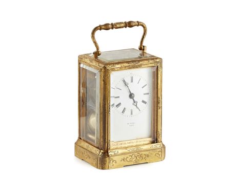 FRENCH ENGRAVED BRASS CARRIAGE CLOCK, HENRY MARC, PARIS 19TH CENTURY the one-piece case engraved with foliate scrolls, enclos