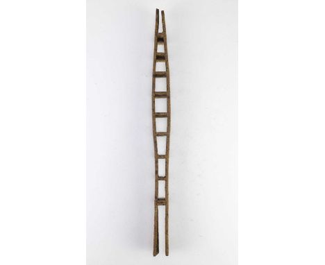 † ANNIE TURNER (born 1958); 'River Ladder', a stoneware sculptural form/wall piece covered in mottled iron glaze, height 42cm