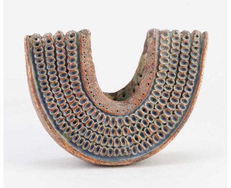 † ALAN WALLWORK (1931-2019); a narrow stoneware wedge form partially covered in iron staining with impressed decoration fille