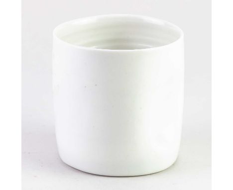 † JOANNA CONSTANTINIDIS (1927-2000); a white porcelain beaker with indented sides, impressed C mark, height 8.5cm.   Conditio