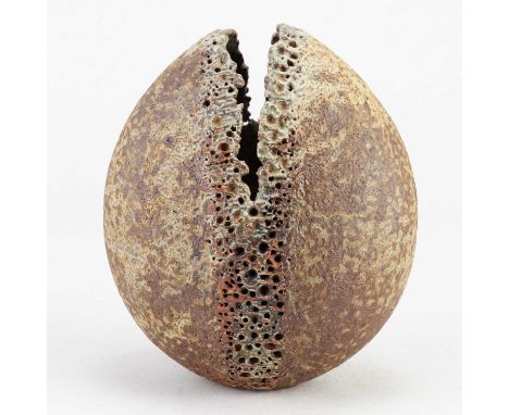 † ALAN WALLWORK (1931-2019); a stoneware split pebble with incised decoration around the parting partially picked out in turq