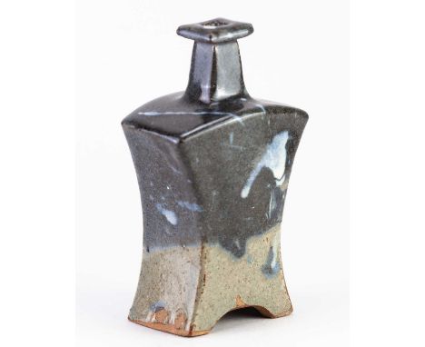 † JOANNA WASON (born 1952) for Leach Pottery; a rectangular bottle of waisted form with a square neck partially covered in bl