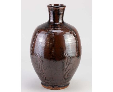 † JIM MALONE (born 1946); a stoneware bottle covered in tenmoku breaking to kaki glaze with combed decoration, impressed JM a