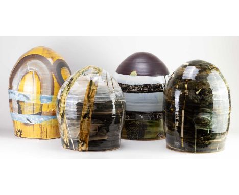 STEVEN GLASS; four earthenware bollard forms covered in different glazes, incised signatures, tallest 47cm (4).   Condition R