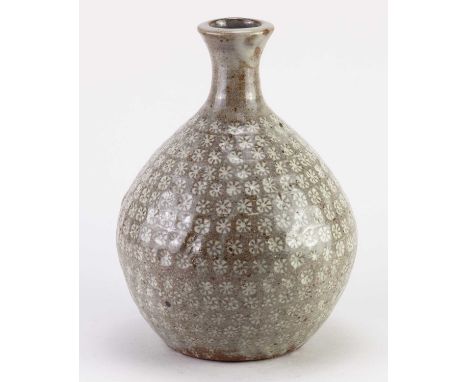 † TREVOR CORSER (1938-2015) for Leach Pottery; a stoneware bottle covered in grey glaze decorated with a repeated impressed f