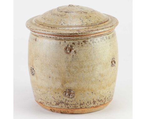 JIM MALONE (born 1946); a stoneware jar and cover covered in green ash glaze with impressed decoration, impressed JM and L (f