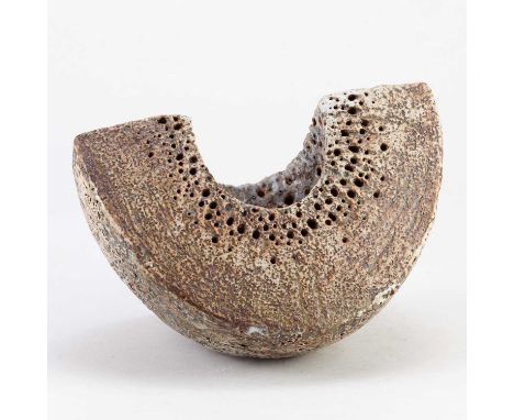 † ALAN WALLWORK (1931-2019); a broad stoneware wedge form partially covered in iron staining with impressed decoration and pi