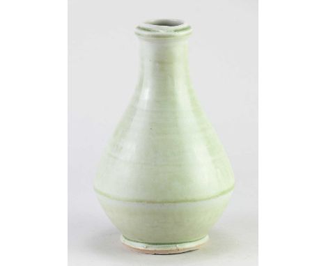 † MIKE DODD (born 1943); a porcelain bottle covered in celadon glaze, impressed MJD mark, height 19.5cm.Condition Report: Nib