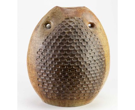 † JOHN VIRANDO; a stoneware sculptural form partially covered in iron glaze with impressed decoration, incised signature date