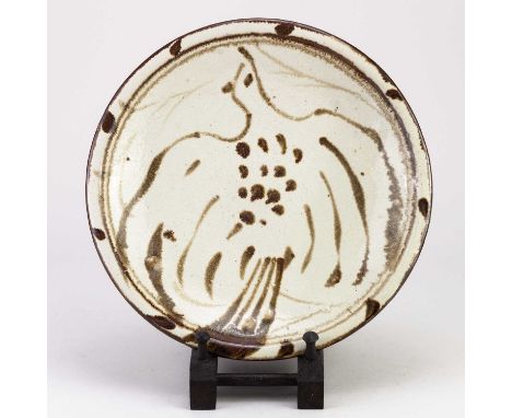 † RUPERT SPIRA (born 1960); a stoneware plate decorated with a dove, impressed RS mark, diameter 26cm.Condition Report: Appea