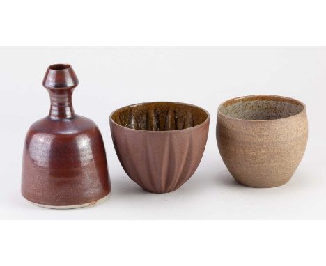 † DAVID LLOYD JONES (1928-1994); a porcelain bottle covered in iron rich glaze, impressed mark, height 13.5cm, a cup by Sue P